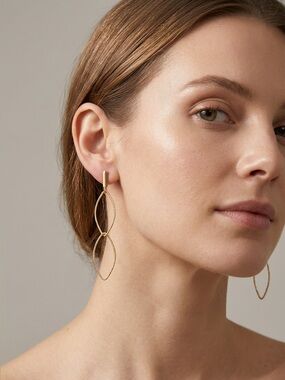 Mia Fiore 28kt gold plated bronze Twisted Drop Earrings
